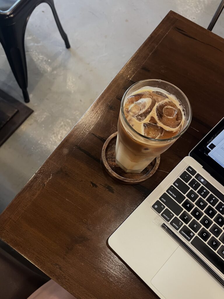 Desk with coffee and computer