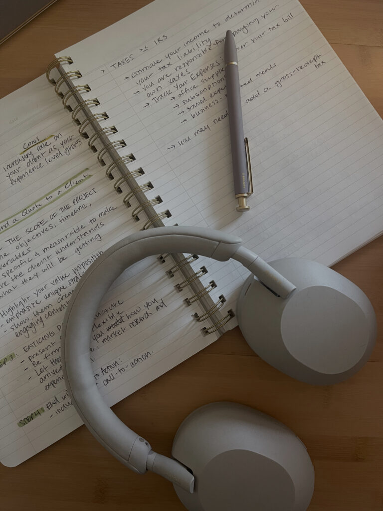 open notebook and headphones